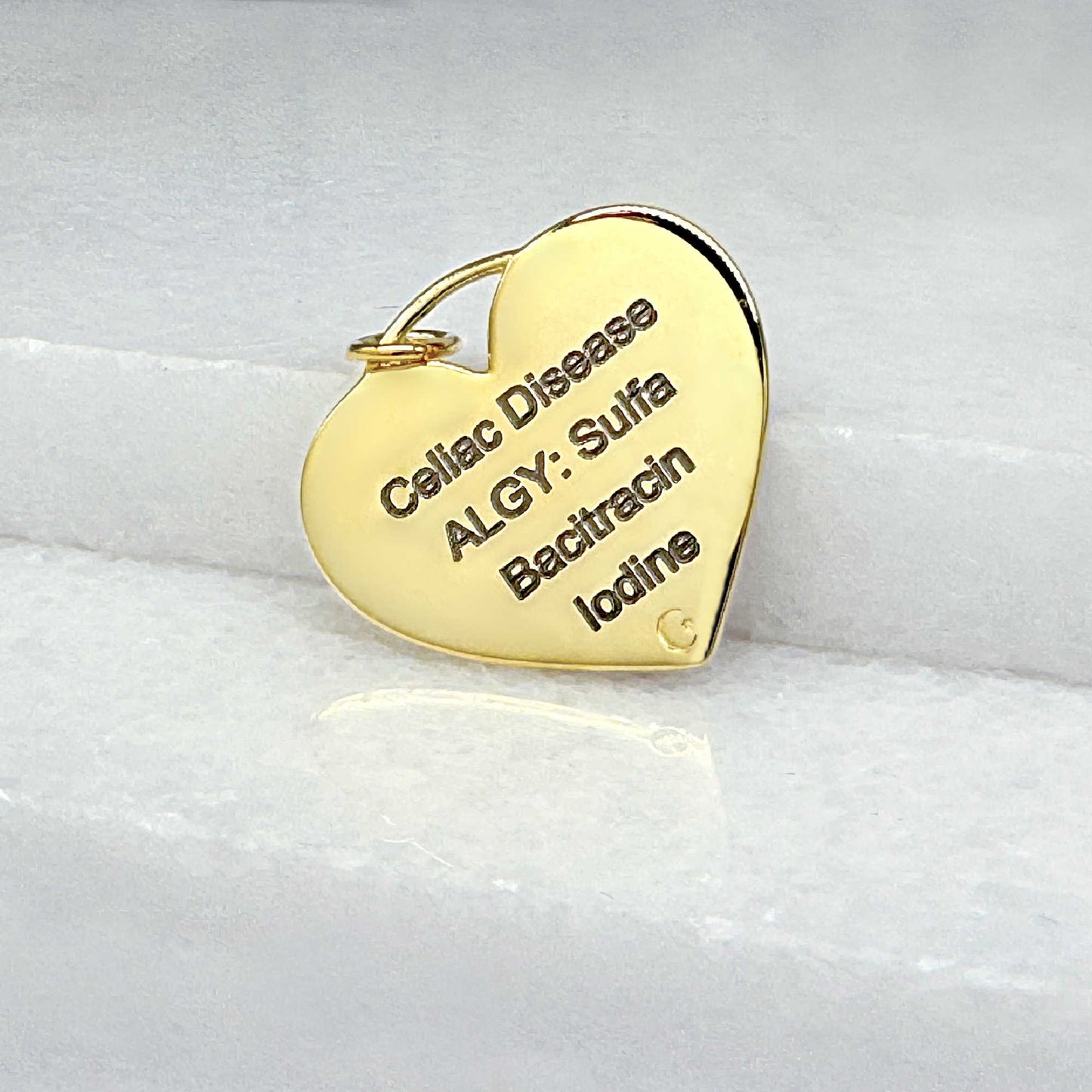 Heart Shaped Medical ID for Women, Yellow Gold Plated Sterling Silver & Garnet, Sample of Custom Engraving & Personalization, from CHARMED Medical Jewelry
