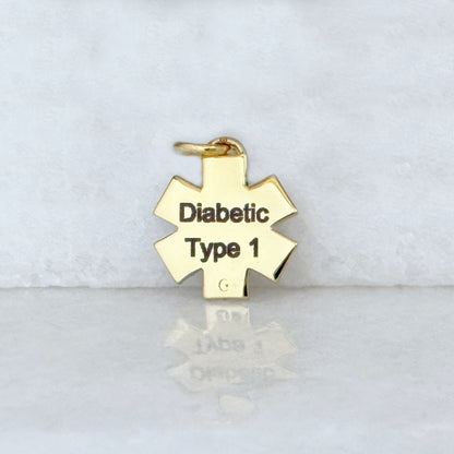 Gold medical ID star of life charm with Type 1 diabetes engraving shown on the back side