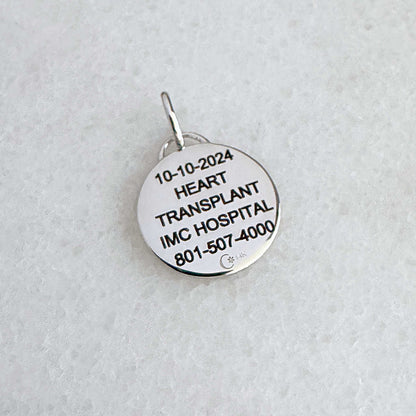 White Gold Medical ID Charm with personalized engraving shown on the back side, 15mm diameter