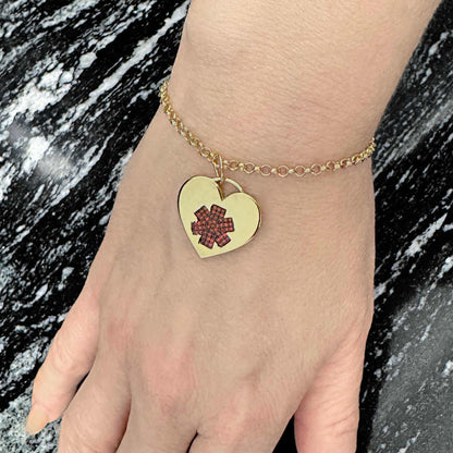 Woman Wearing Medical ID Heart Bracelet, Gold Plated Sterling Silver Medical Alert with Garnets and Personalized Engraving