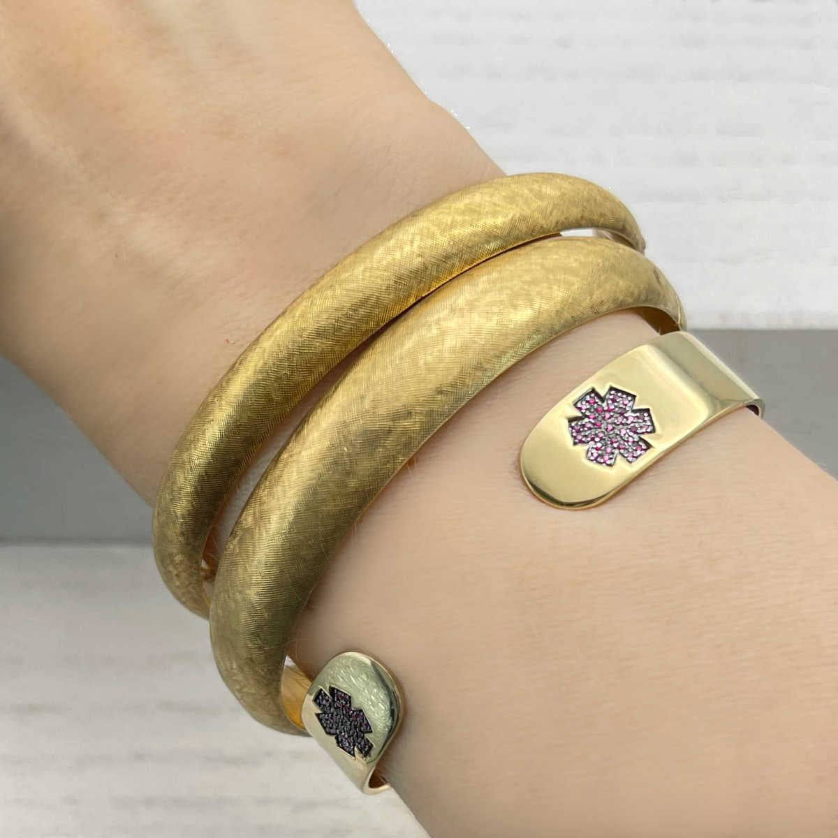medic alert ID cuff bracelet for women on model | 14k yellow gold ruby | Charmed Medical Jewelry
