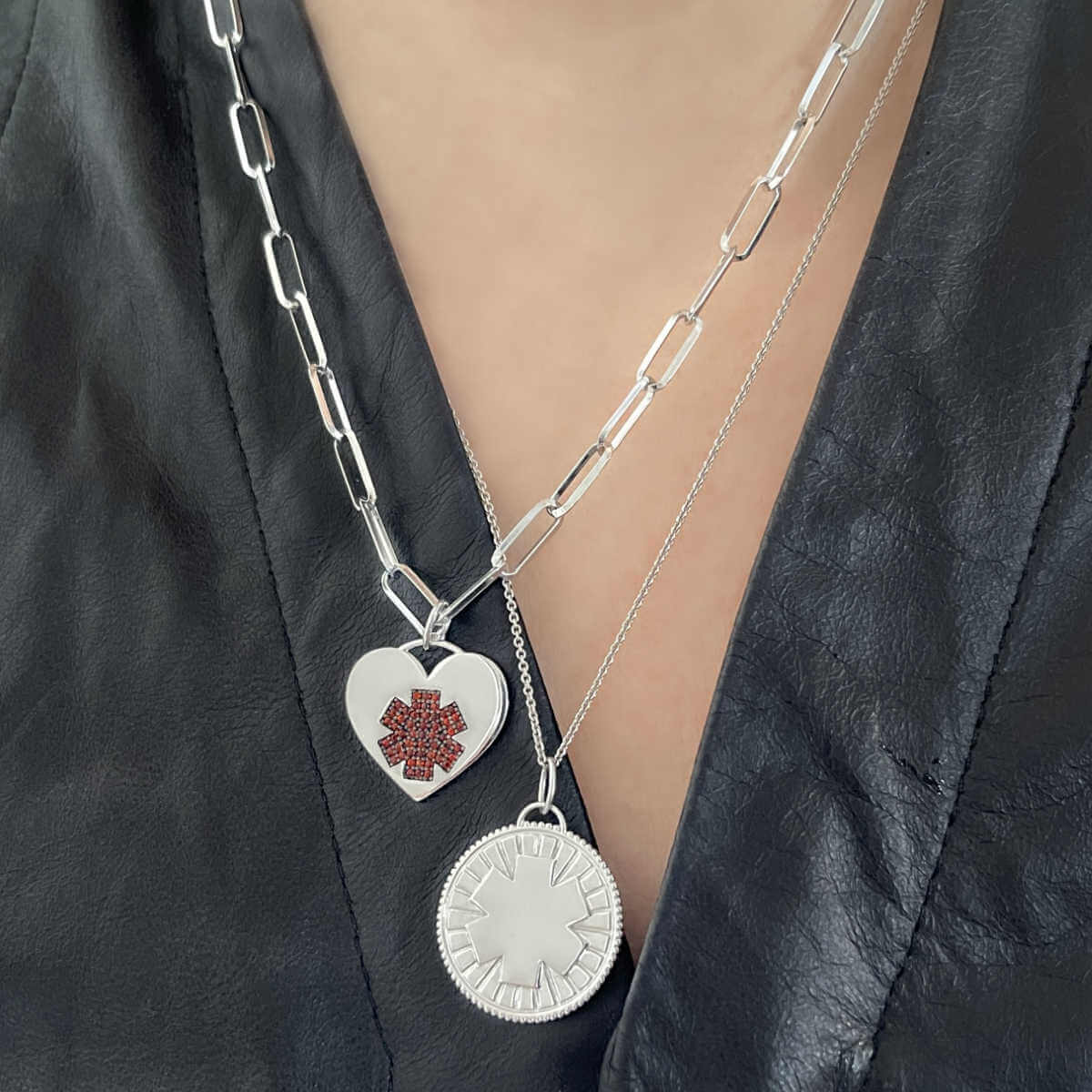 Woman Wearing Medical ID Charm Necklaces, Sterling Silver Medical Alerts with Garnets and Personalized Engraving